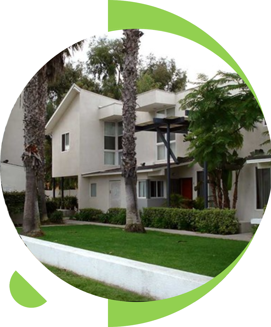 A picture of a house with trees in the background.